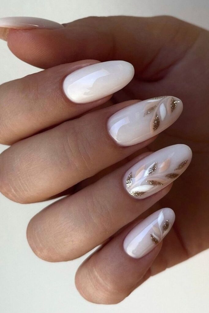 White Nails with Leaf Designs