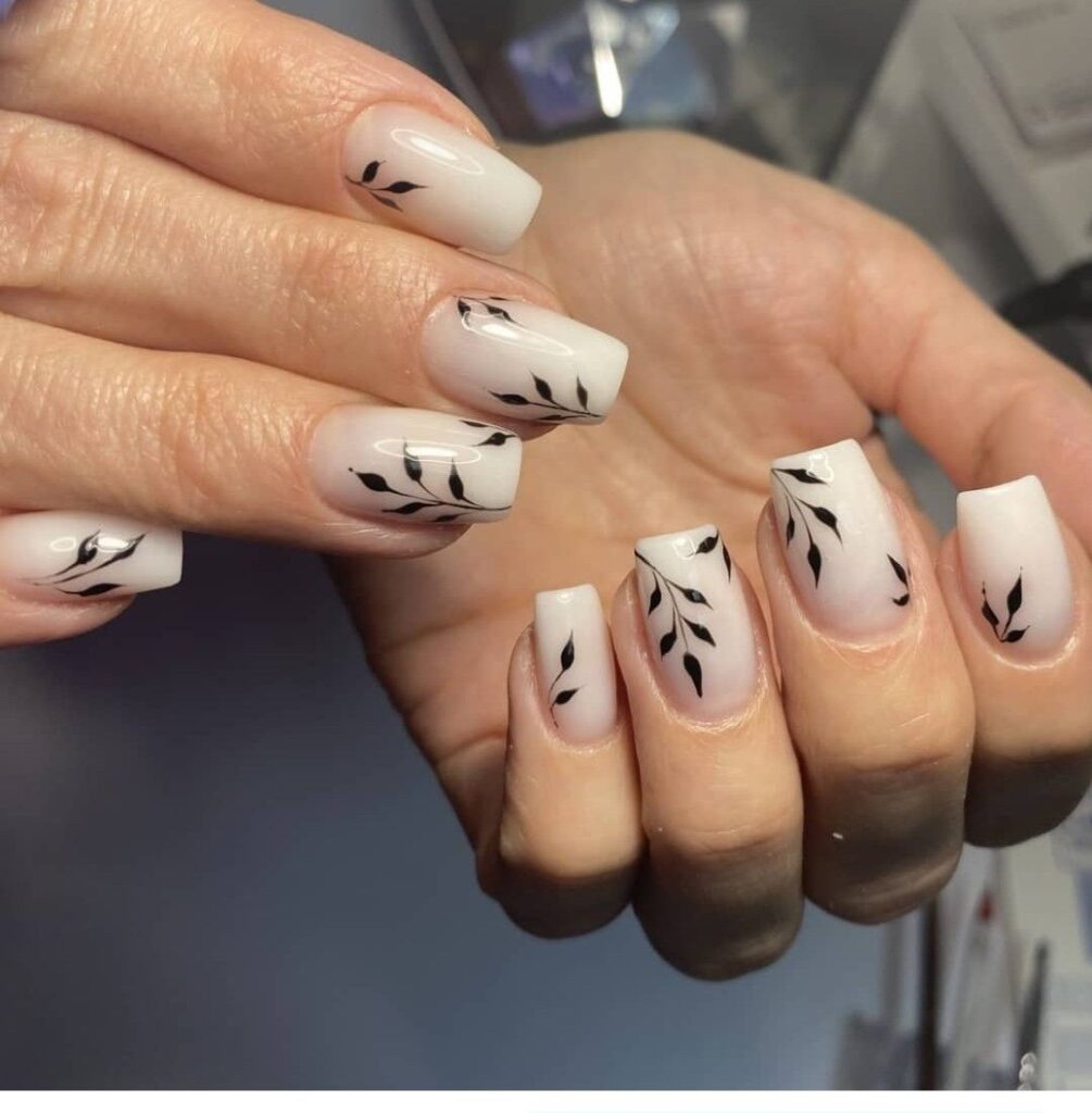 White Nails with Black Leaf Details