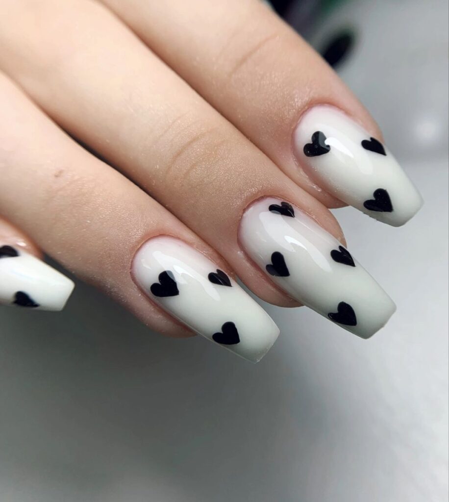 Winter White Nails with Black Heart Accents