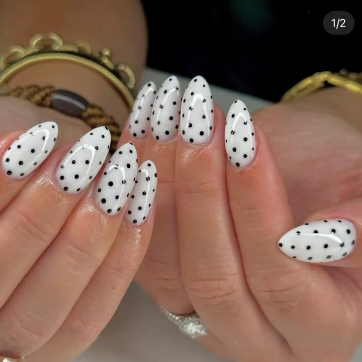 White Nails with Bold Black Dots