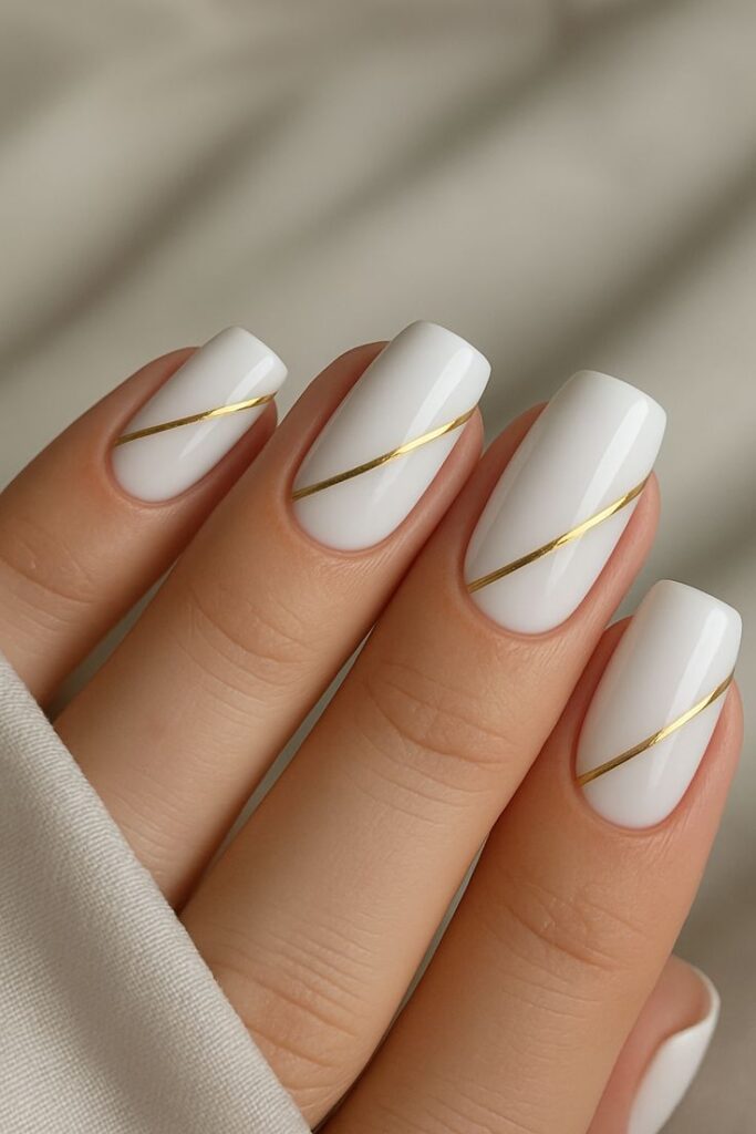 White with Gold Accent Nails